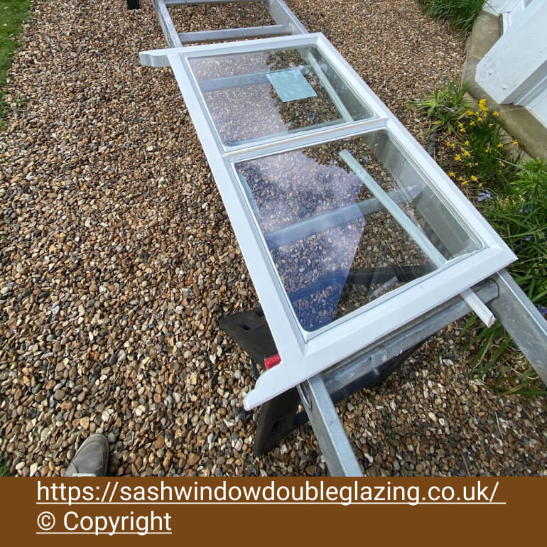 Sashes on trestles with the new vacuum units fitted