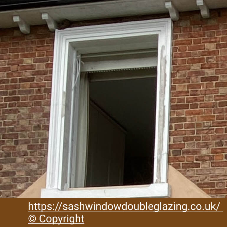 Box frame in a brick wall with both sashes removed